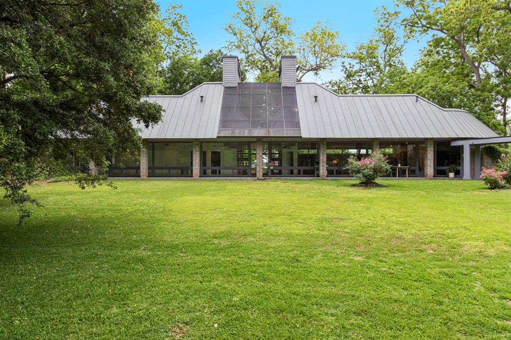 .Another view of the covered porch which provides an incredible amount of extended outdoor living space. Your home will be the gathering place of family and friends.