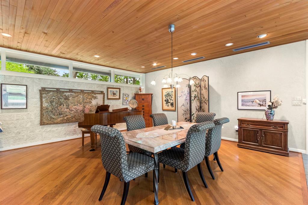 A closer view reflects the size of the dining room, there is even room for a baby grand piano and side pieces in this great space.