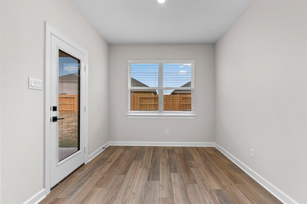 Dining area with backyard access.