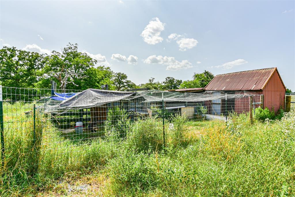 Currenlty used as a chicken coop and yard, this barn can be used for any small livestock.