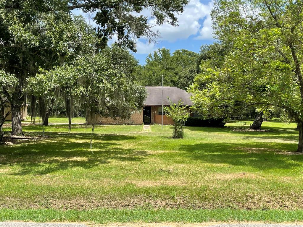 This charming 3 bedroom 2 bath brick home on 3 acres offers endless potential with some updating. Surrounded by mature trees, the property exudes a serene country ambiance. Don't miss out on the opportunity to turn this well-built house into your dream home. Schedule a showing today before it's too late.