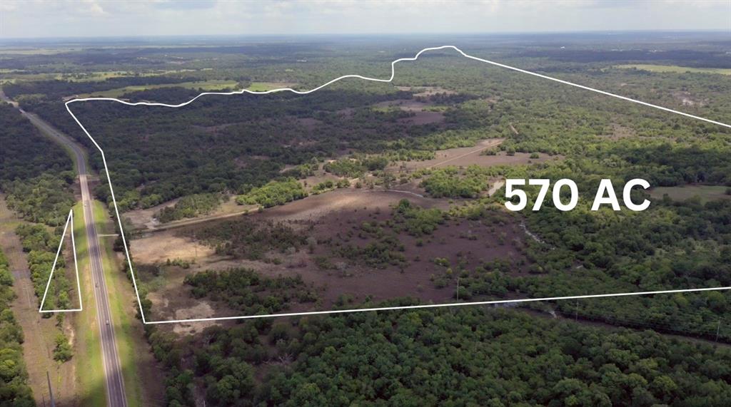 This remarkable 570-acre tract, with an additional 1,083 acres available, is located just minutes from Texas A&M University in College Station. It presents a versatile opportunity, ideal for development, agriculture, or ranching. Situated along the Navasota River, the property boasts lush, fertile land, ideal for various agricultural endeavors or as a picturesque ranch. Its proximity to a major university enhances its potential for residential or commercial development, capitalizing on the area's growing demand. This expansive parcel with almost a mile of road frontage combines scenery with practicality, making it a prime investment for a discerning buyer.