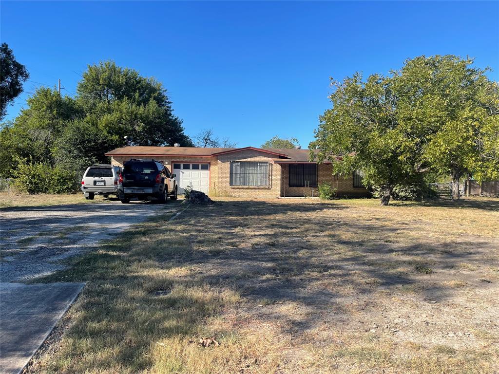 This 3-bedroom, 1.5-bath home sits on just under an acre of land, offering plenty of space and privacy. While it needs some TLC, it’s full of potential for the right buyer. The large lot is ideal for outdoor activities, gardening, or even expanding the home. Inside, the layout includes a comfortable living area, spacious bedrooms, and a convenient half bath. Whether you're an investor or a homeowner looking for a project, this property is a great opportunity to transform a solid structure into your dream home. Embrace the potential and make it your own!