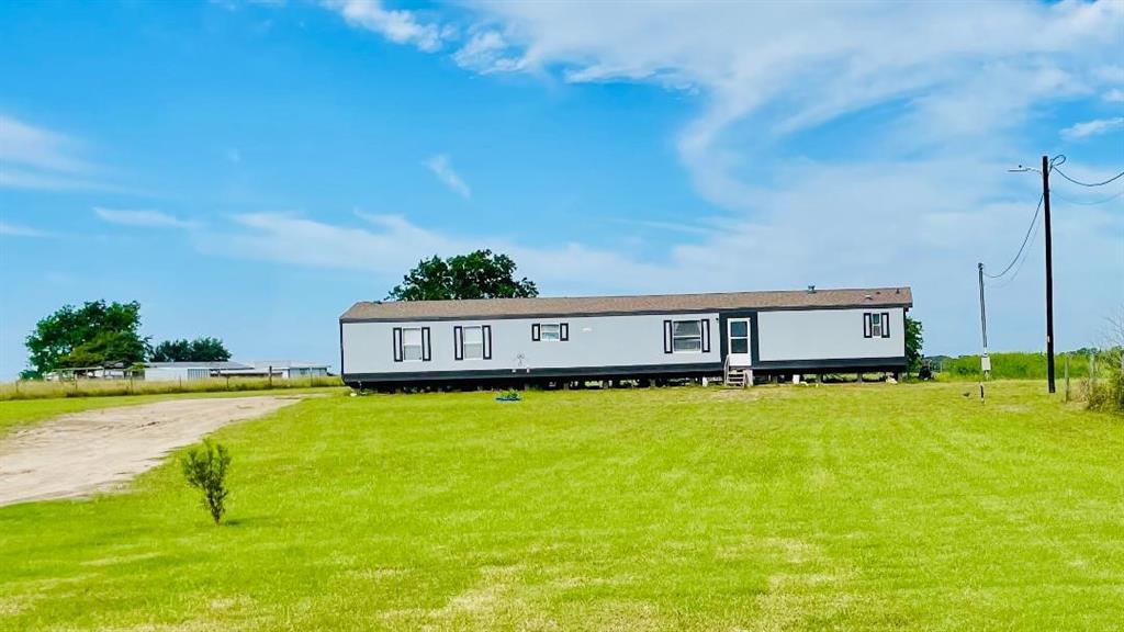 Motivated Seller: Great opportunity to own 4 country acres with a BONUS 2 well maintained mobile homes on the property. 2004 960 sq ft 2/2 with, and the 1998 with 1216 sq ft 3/2.