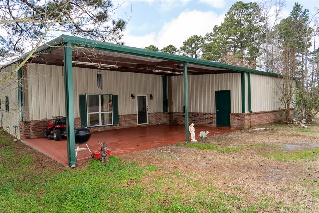 Enjoy your new LIFESTYLE in the country. Beautiful wooded and pastured slice of heaven in the heart of Leon County! Nestled on 21.1 acres of hard and soft woods just off CR 132 . Featuring a Mueller Barndominium offering 3 bedrooms, 2.5 bathrooms, attached garage, large living room and additional extra large storage room. Other features include a large kitchen open to dining and living area, commercial grade gas stove , gas oven and electric oven, granite counter tops, walk in pantry, fireplace and generator. A wonderful front porch, gated entrance, storage barn w/electricity and perimeter/cross fencing. Enjoy this peaceful sanctuary, pond and retreat with family, friends and your favorite herd. Look forward to meeting you soon!