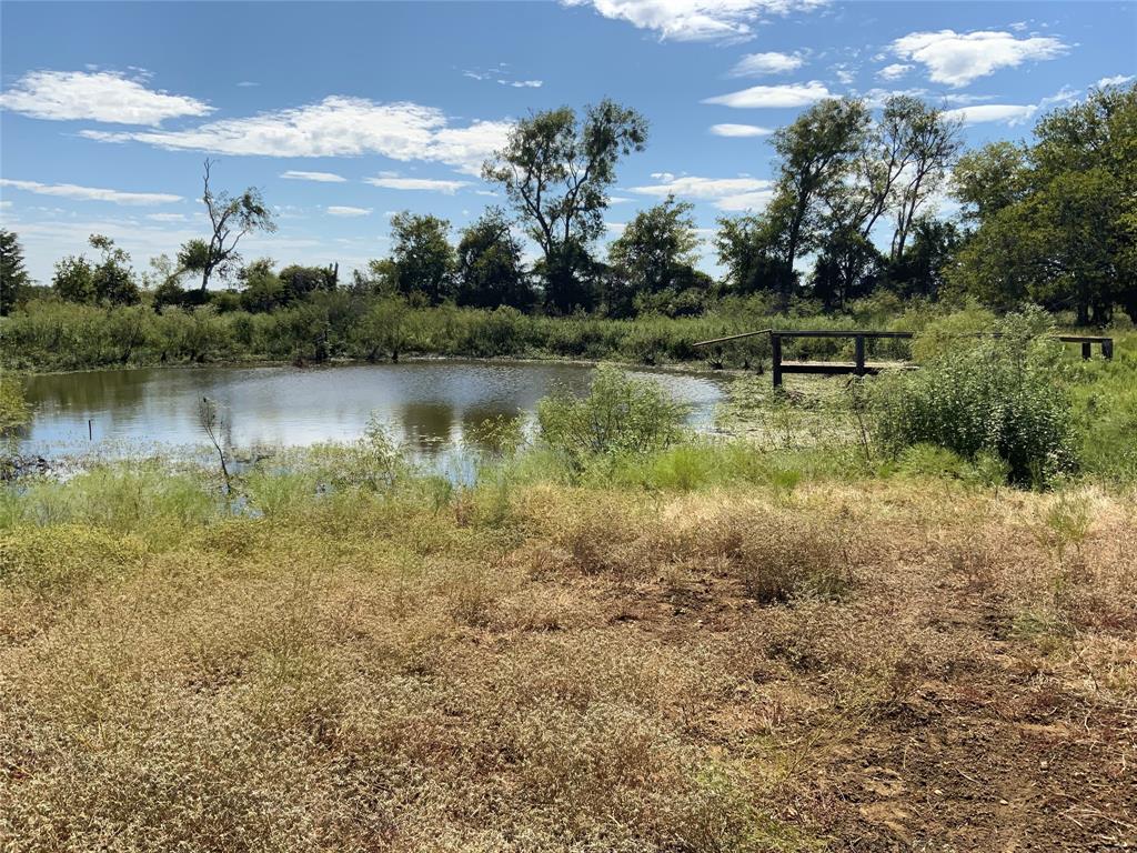 Nestled on 5 acres this pier and beam home offers endless possibilities and is ready for your creative touch.  The property features a pond, perfect for fishing or simply relaxing by the water's edge.  This property is more than just land, it is perfect for families or those looking to invest in a weekend retreat.  Schedule an appointment today!