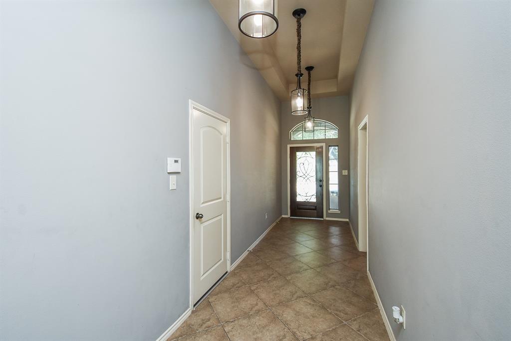 foyer with coffered ceiling
