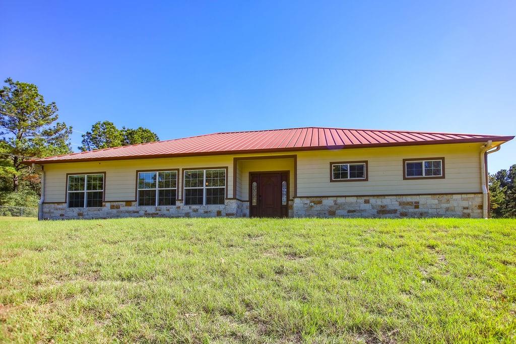 Wooded Paradise has a beautiful home on a hill overlooking 38.11 acres, with some clearing but mostly trees.
Inside the home is 2470 square feet of living space completely furnished.  This includes 3 bedrooms plus an office/study
2 Bathrooms, game room including Pool Table and Air Hockey Table. The kitchen has all stainless-steel appliances. This house has it all. Just bring your Linens and food. Also, you can hunt on the property and fish out of the creek!