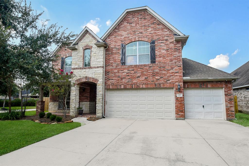 Stone & Brick home with front porch elevation located on a cul de sac street. This home sits on a beautiful tree lined corner lot with a spacious backyard and an wood deck for outdoor entertaining.Added bonus is a 3 car attached garage. Interior features include leaded glass front door, laminate wood flooring on first floor, 2 story entry and family room,stone fireplace,granite kitchen with stainless appliances and walk in pantry. Private study with french doors that overlooks the front porch,downstairs primary bedroom and ensuite bath with dual sinks & walk in closet,spacious game room and media room upstairs, 3 large bedrooms with walk in closets upstairs too. Secret room behind bookshelves in bedroom 3. Fresh interior paint, recent exterior fence Cyfair schools, Fairfield amenities including community sports, parks, pools, athletic center, trails, lakes and more.  Close to shopping and great access to 290, and 99.  Must see to appreciate all this property has to offer.