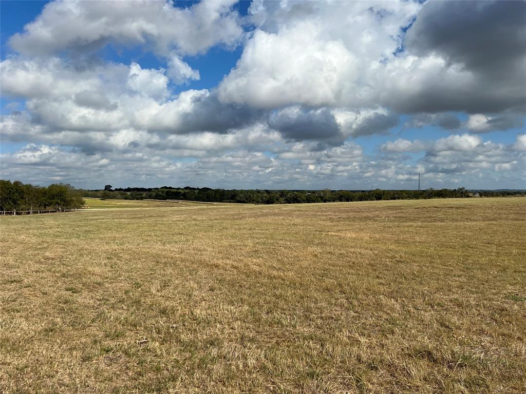 Looking for the ideal property to build your dream home on? This is it! Approximately 6.75 acres (to be confirmed by survey) of hilltop views in the most beautiful part of northern Austin County & award winning Bellville ISD. You are surrounded by large ranches and have the beautiful feel of country life while still being only minutes from Brenham and all of the conveniences it offers. With ag exemption already in place (hay & cattle), your taxes are low. Come pick out the perfect home site to enjoy the sunrises and sunsets while you prepare for fields full of bluebonnets and other Texas wildflowers every spring. ADDITIONAL ACREAGE IS AVAILABLE! Properties like these don't come around very often. Schedule your showing today because this property won't last long!