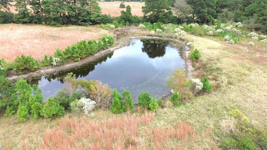 EAST TEXAS RANCH! This 140+ acre property is an absolute must see! Located off State Highway 19 on Cut Road, this ranch is conveniently located between Lovelady and Crockett, TX. It has been used for hay production and running cattle. This property has multiple homesites making it a great spot to build your forever home or just to expand your cattle operation. You will love the 4 ponds, hay barn, perimeter fencing, and cross-fencing. There is electricity on the property and there is an old water well – condition unknown. For more information or to schedule a private showing, give us a call today!