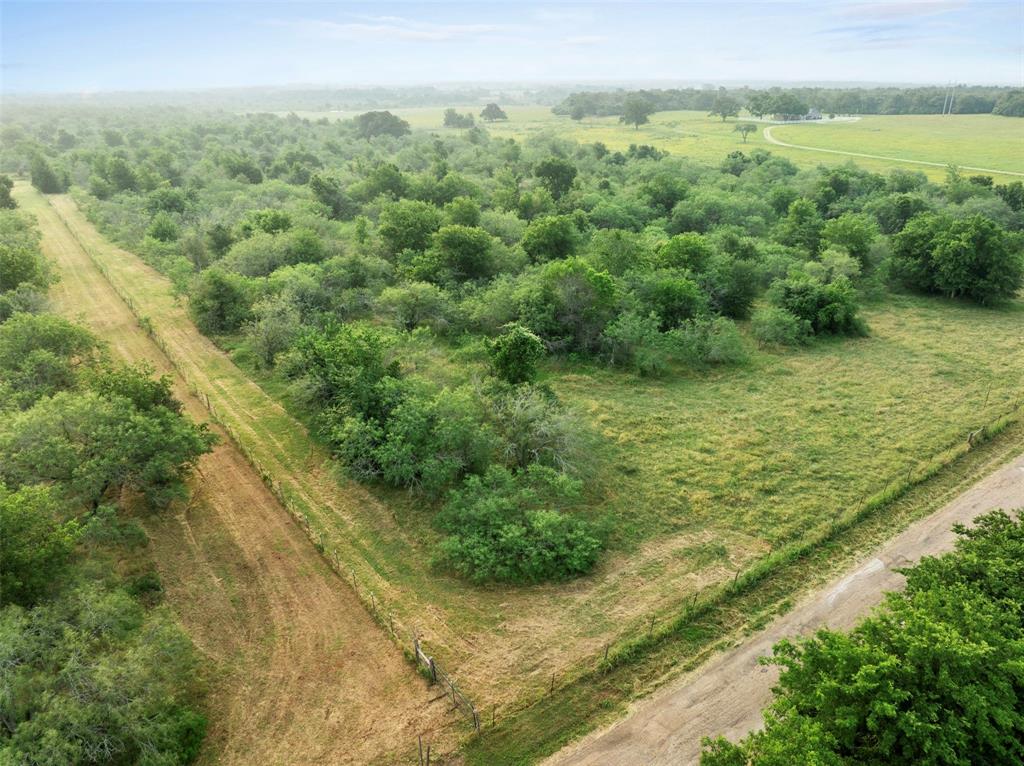 Right between College Station/Bryan and Austin, great location less than five minutes from town and down quiet 
CR 407. Just over 22 acres of rich prairie soil and mesquite that make it a good hunting property with scenic views in every direction and plenty of space to carve out a nice spot for a home too!
**Electric on property and Lee County Water is available.**