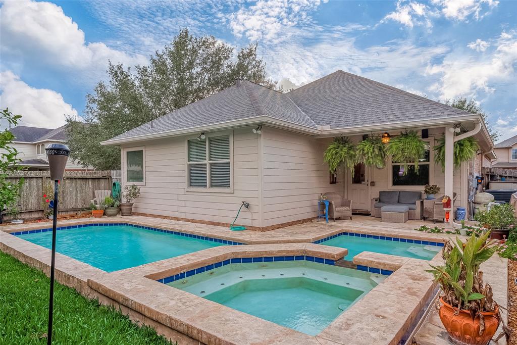 NEW ROOF (10/24) Welcome home to 6111 Starbrook Creek located in Westheimer Lakes and zoned to Katy ISD schools! This lovely home features 3 bedrooms, 2 full baths, a swimming pool with a hot tub, and a 2 car garage. The floorplan is awesome with a family room that opens to the kitchen and dining area. The kitchen has beautiful 42" cabinets and lots of counter space. End your day in the spacious primary suite looking out to the pool. The primary bath includes a jetted tub, a separate shower, double sinks and a walk-in closet. Take time to step out back for a view of the covered patio and private pool. Imagine yourself relaxing in the hot tub and entertaining friends at the swim-up bar. This home is part of the wonderful Westheimer Lakes community with amenities such as a Splash Pad, walking trails, playgrounds, a basketball pavilion, and tennis courts. Minutes away from the Westpark Toll Road and Highway 99 for a fast and easy commute. Don't miss out on this wonderful opportunity!