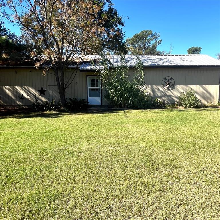 This cozy 1-bedroom, 1-bathroom home sits on a 1.5-acre lot and offers 1,200 sq. ft. of open-concept living space (per CAD), providing plenty of room to expand. The property includes several versatile outbuildings, such as a 20x25 storage building with a porch, a 4-stall pole barn, and a dedicated entertaining area perfect for cookouts.
With road frontage on two sides and brand-new wood fencing, this property combines privacy and accessibility. Conveniently located just 5 miles south of Centerville off FM 1119, it’s part of the desirable Centerville ISD. This property is a fantastic opportunity for a primary residence or weekend retreat.