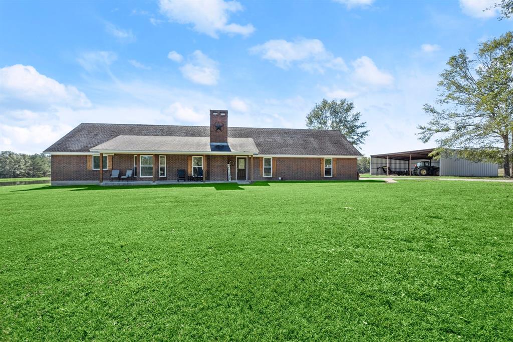 Tucked away on over 41 acres of beautiful acres, this well-maintained 3-bedroom, 2-bathroom brick home offers both comfort and practicality, with plenty of room to spread out and enjoy the best of country living. With a bonus room upstairs, recent upgrades, and a spacious layout, this property is perfect for those looking for a peaceful retreat with modern amenities. The bonus room provides a versatile space perfect for a home office, playroom or guest suite. A sturdy, long-lasting roof was installed just a few years ago for peace of mind. Gather around the cozy fire pit in your backyard, ideal for evening relaxation or entertaining guests. From the back porch, you can look out over the pond and enjoy fishing. Plenty of storage in the storage building and another covered storage for trailers and farm equipment. Whether you're looking to create your own hobby farm or simply bask in the tranquility of rural living, this property offers endless possibilities. Come take a look today!