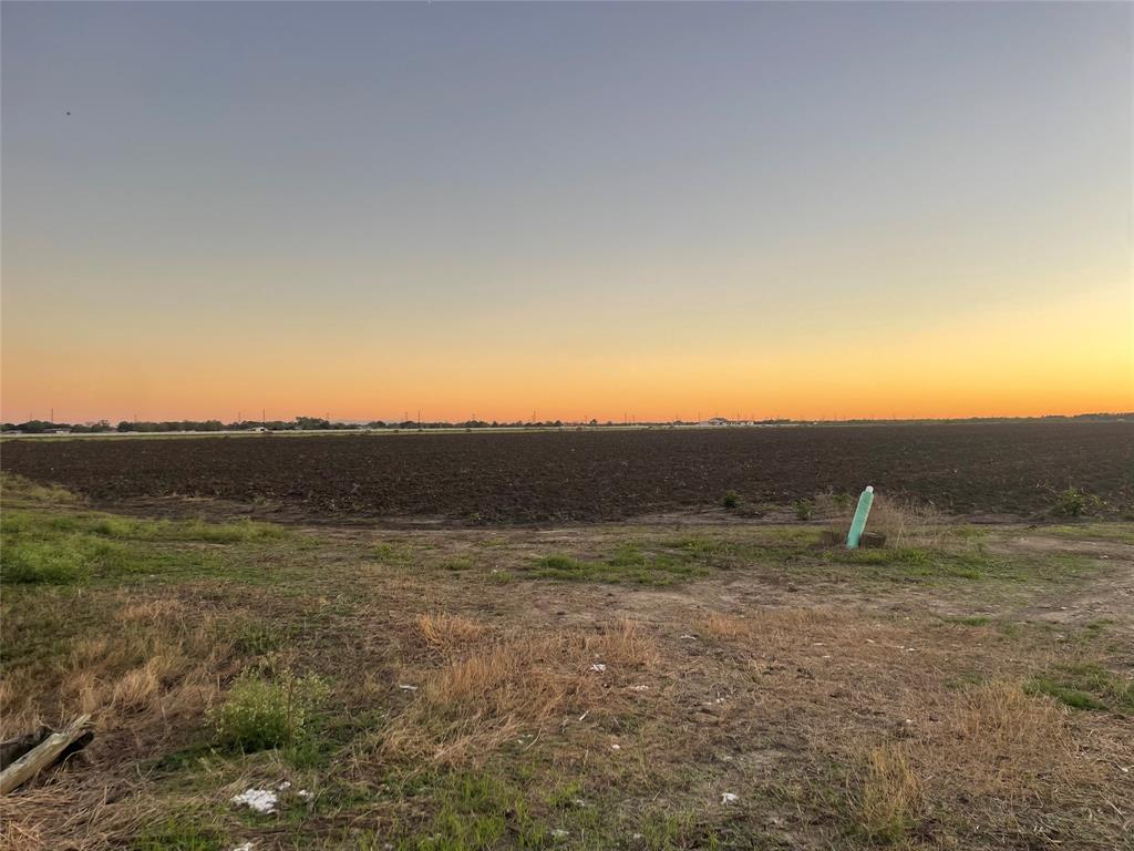 13 acres +/- ready for new owners in growing Needville, TX! New survey at buyers expense. NO HOA. Build your dream home on this lovely tract or continue with current crop lease. LOW 1.9 tax rate with current Ag Exemption. Horses allowed. Minutes from HWY 36. Schedule a tour TODAY! Turn on dirt road where you see our signs at Zamanek. Property starts once you pass the wood bridge, look small white sign is placed there. LAND ONLY- the home to the left is owned by someone else.