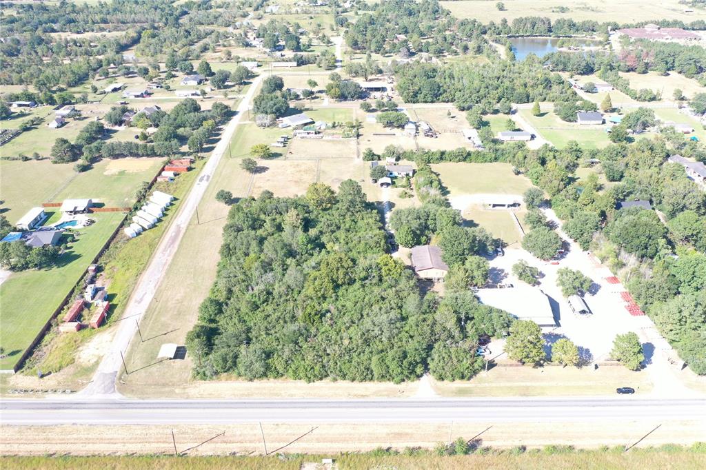 LOCATION LOCATION LOCATION ! ALL COMMERCIAL/RESIDENTIAL  FRONTAGE ON 2920 1 MILE FROM 290!
**4 ACRES OF UNRESTRICTED LAND THAT CAN BE USED FOR BOTH COMMERCIAL AND OR RESIDENTIAL!**
THIS IS YOUR OPPORTUNITY TO BUILD OFFICE SPACE OR COMMERCIAL DEVELOPMENT IN A HIGHLY SOUGHT AFTER LOCATION! With all of the new developments surrounding and coming in this is a great time to invest.
Property partially cleared, High and Dry not in flood zone, being sold as-is for land value and has electricity, septic/sewer and water well so there are NO MONTHLY BILLS for water / sewer. 
 CALL TO BOOK YOUR SHOWING TODAY!  THIS WILL NOT LAST LONG!