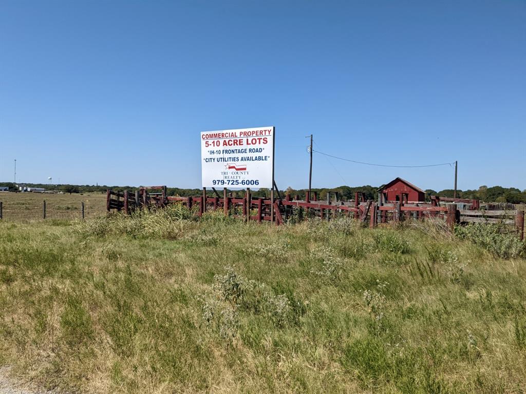 1 Mile East of Weimar FM155 & Interstate 10 intersection. On feeder road, County Road, Running along Interstate 10 on the north side.