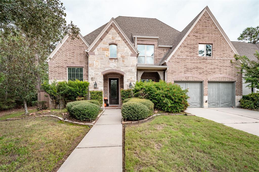 Beautiful 4 Bedroom home with office and media room in the desirable community of The Groves! This popular two story floor plan with a brick and stone exterior has two bedrooms down and two bedrooms up. Downstairs is an extended Master Suite which includes a sitting area that overlooks the backyard. The beautiful Kitchen offers plenty of cabinet space with a large Island, quartz countertops and stainless steel appliances. This home features a large game room on the second floor plus a media room. There is an extended covered patio off of the Breakfast room with a good size backyard space. There is also only one neighbor to the right and a green space to the left of this beautiful home so plenty of privacy abounds. Come see everything this spacious home has to offer.