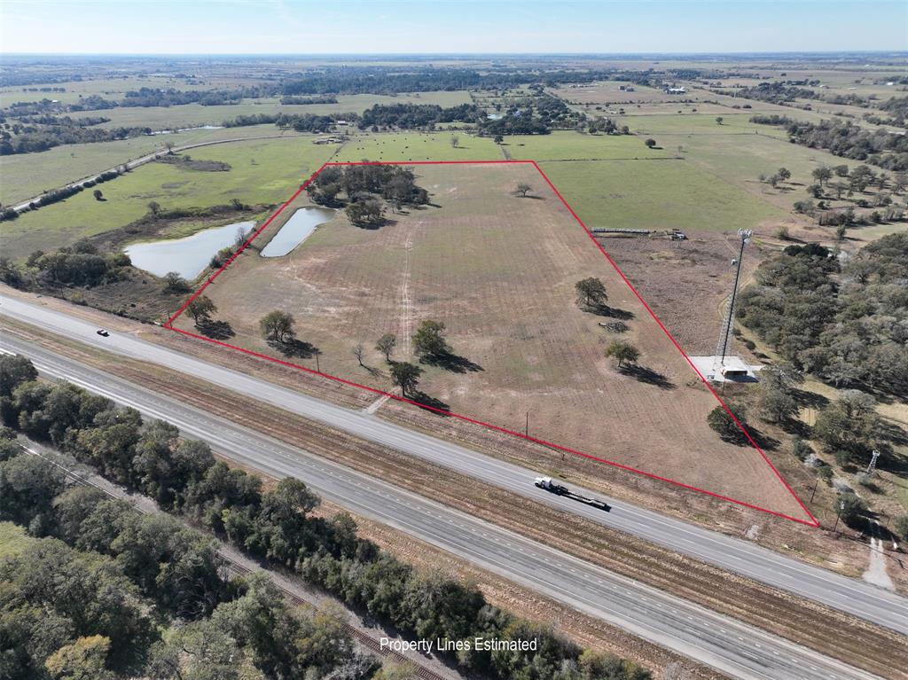 These 32.6 acres are situated on Highway 36 between Sealy and Bellville near FM 949. With over 880' of road frontage this unrestricted tract allows the option for prime commercial opportunities. The property is perimeter fenced with a stocked, spring-fed pond, mature trees and is currently under an ag-exemption allowing minimal Austin County property taxes. Schedule today to tour the land...