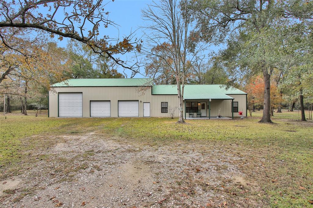 Clean and well-kept 3-bedroom 2 bath barndominium on 10 acres!!  The overall building is 3600 square foot, with 1600 foot of living area and 2000 foot of shop.  The living area has 3 bedrooms and 2 baths, large living area with a wood burning stove, the kitchen is open, with lots of counter space and a large pantry.  Oversized laundry room, big enough for washer, dryer, extra fridge and deep freeze.  In the shop there are 4 roll up doors, 3 on the front and one on the back with an office/work area built out in the middle.  Small fenced area for a garden, wildlife in the area and some nice mature hard wood trees.