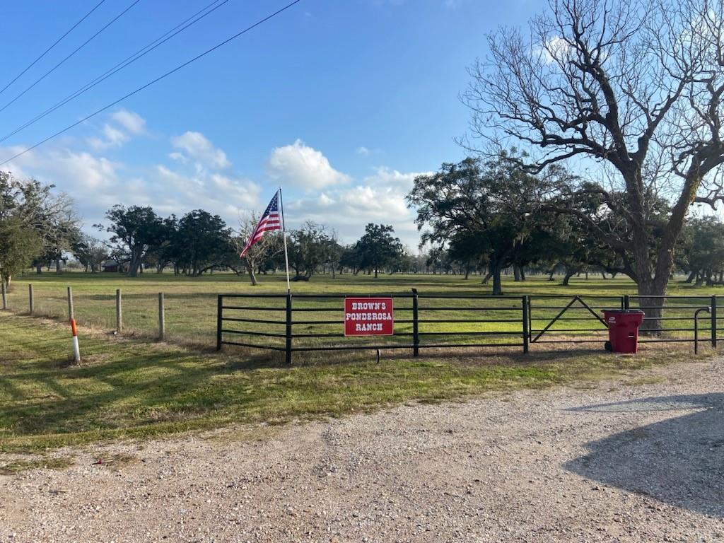 This 400 acres is one of the few show place cattle ranches in Matagorda County.  Located on the bank of Caney Creek, it is blessed with the rich red dirt soil that is the envy of every cattleman.  The pens and facilities are centrally located.  The roads are all crowned and rocked.  Drainage is highly improved to drain to creeks and 8-acre lake, which is fully stocked and managed.  The pastures are improved and shaded with mature oak and pecan trees.  Recreation opportunities include deer and hog hunting, bass fishing and birdwatching.  Matagorda County is the number one bird watching county in the United States, year after year.  Located just one hour southwest of Houston, this property is a developer's dream.  The ranch home and guest house provide the perfect setting for fine entertaining.  Conveying with the ranch are many depreciable assets including road material and all ranch equipment.