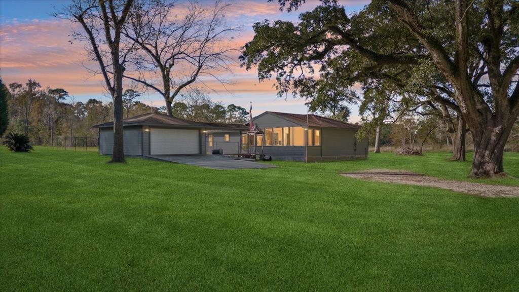 Your perfect piece of tranquility as the last house at a dead-end road! Framed by shade trees! Plenty of room on a 12.35 acre spread! Screened-in front porch and a sunroom off the primary bedroom, both for lounging and enjoying the view! Fitted cabinetry and built-ins throughout! Experience the wonderful wildlife surrounding you!