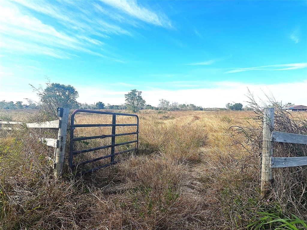 WELCOME TO TEXAS! THIS PROPERTY IS A PERFECT COUNTRY HOMESITE WITH WELL, SEPTIC AND ELECTRIC. THE METAL BUILDING HAS 1 BATHROOM WITH SHOWER, CONCRETE FLOORING, KITCHEN AREA AND A LARGE FARM AND RANCH GARAGE DOOR WITH OPENER. THE PROPERTY HAS AN ELEVATED HEAVY BASE DRIVE THAT GOES BACK TO THE BARN. THERE ARE TWO FULLY STOCKED MATCHING PONDS ON EACH SIDE OF THE DRIVE. THE LEFT POND IS STOCKED WITH CATFISH AND THE RIGHT POND IS STOCKED WITH BASS AND PERCH. THE PROPERTY IS FULLY FENCED AND HAS A CREEK ON THE BACK OF THE PROPERTY. THE PASTURES ARE COSTAL BERMUDA AND HAY PRODUCING. THIS IS THE PERFECT PLACE TO BUILD A HOME WITH THE TWO BEAUTIFUL PONDS! NOT TOO FAR OUT OF TOWN, BUT JUST FAR ENOUGH. PLEASE CALL TO SEE THIS PROPERTY. 
THE  PROPERTY ADDRESS INCLUDE  24730 thru 24810, FM 2004. THREE SEPERATE TAX ID.