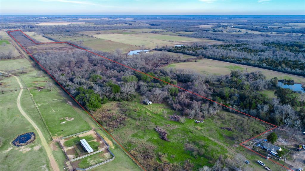 Secluded 80+ acres with lots of potential!  Ideal for recreational use, cattle, or hunting land. Property is very wooded with an area in the back that was used as a hay meadow. The road to property is an easement for other property owners that are all located at the very front of the property. A good portion of the property is located within the flood plain.  Property is currently leased out for cattle to maintain ag exemption.