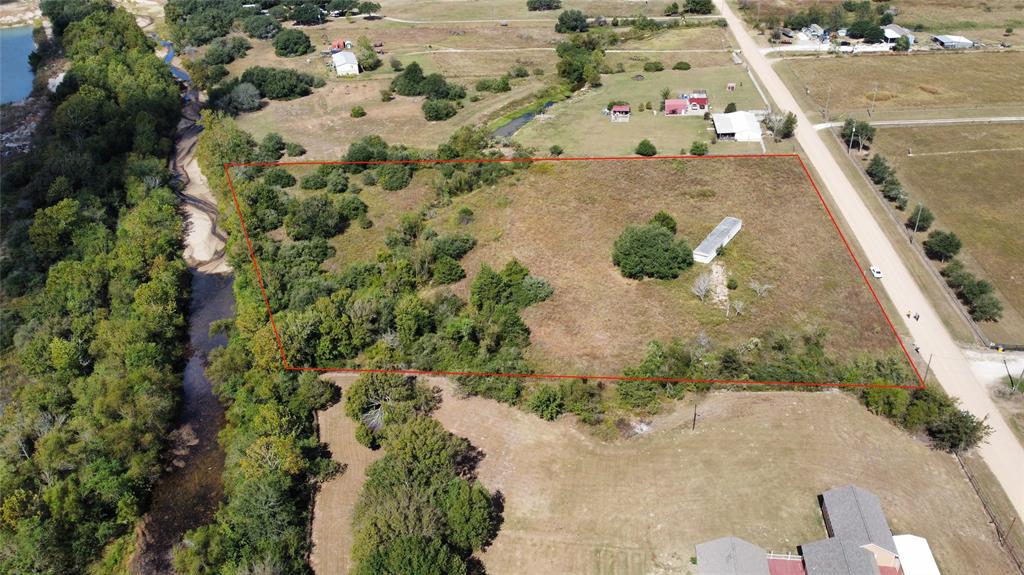 UNRESTRICTED 5-acre property with electricity already in place, directly off I-10. Raw land ready for multiple uses - agricultural, ranching, farming, or commercial development. No deed restrictions or zoning limitations. No water or septic system installed. Excellent accessibility: FROM I-10 WESTBOUND FRONTAGE ROAD, TURN ONTO SCHULTZ RD. PROPERTY IS IMMEDIATELY ACCESSIBLE AT 433 SCHULTZ RD (LESS THAN 0.3 MILES). Property offers unlimited possibilities due to unrestricted status.