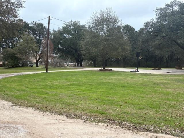 Outstanding Unrestricted Development or Investment opportunity in close proximity to several residential and commercial properties. Great Location with over 600 ft of road frontage on FM 1097 rd. W. The average traffic count is over 10,000 vehicles daily on FM 1097. Located in Montgomery County and Willis ISD with a low tax rate.