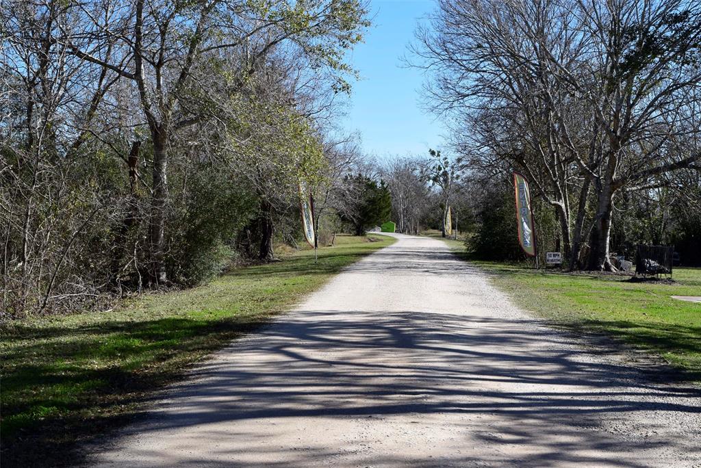 10.36 acres just 1 mile from Bay City hub. Features 50 RV spots with room for expansion, each with separate meter. Secluded for privacy, low road noise. Water well pumps 210 GPM, own septic system. Barn-style pavilion for guests. No city taxes. Nearby industrial plants attract influx of people. Electricity by Jackson Electric Coop. Just 30 mins from coast for prime fishing.  1 hour away from Houston.