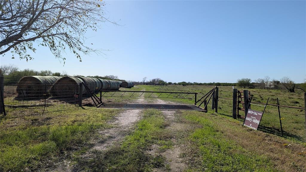 This is a perfect property for commercial use possibilities or agricultural use as pastureland ... either way, the price is right!   It is rare to find this size property on the edge of a city.  For pastureland use, you are only minutes away for checking cows and managing the pasture.  For commercial use, rail frontage is an amenity that should not be overlooked, not to mention the easy access to I-69 (US Hwy 590.