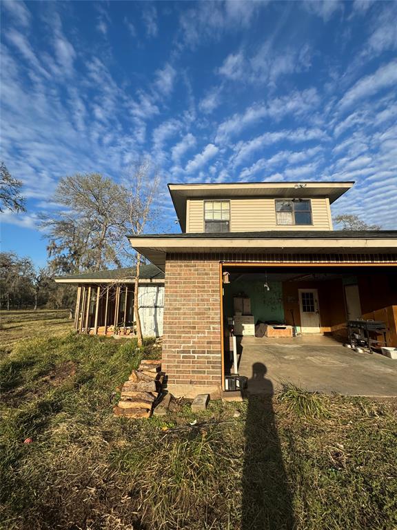 This two-story home, featuring 2 spacious bedrooms and 2 bathrooms, offers endless potential and is ready for a full rehab. Whether you're aiming to restore its original charm or modernize it to suit your style, the solid foundation is there to create a true masterpiece. Situated on 10 acres and surrounded by mature trees, the property provides a peaceful, country setting. Don’t miss the chance to transform this well-built house into your dream home.