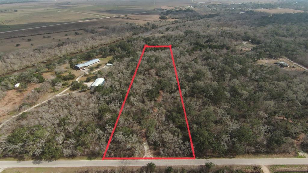 Nestled on a 6.5 acre lot, this property features a 700 ft cleared driveway leading to a prime homesite surrounded by mature trees and abundant wildlife. The perfect setting for a private retreat or a new dream home. No restrictions allow for endless possibilities. Well and septic required. Survey and elevation information available. Adjacent 6.5 acres of unimproved land is also available for those seeking even more space to enjoy. Enjoy the tranquility and natural beauty this property has to offer.