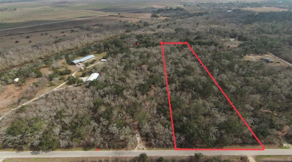 Nestled on a 6.5-acre wooded lot near the beach and Matagorda Bay, this property offers a serene escape. Ideal for building a private retreat or admiring nature's beauty, the land boasts mature trees, wildlife, and tranquility. Adjacent 6.5-acre Lot 6 is also available. With no restrictions, this parcel requires well and septic for a residence. 
A survey and elevation report are available.