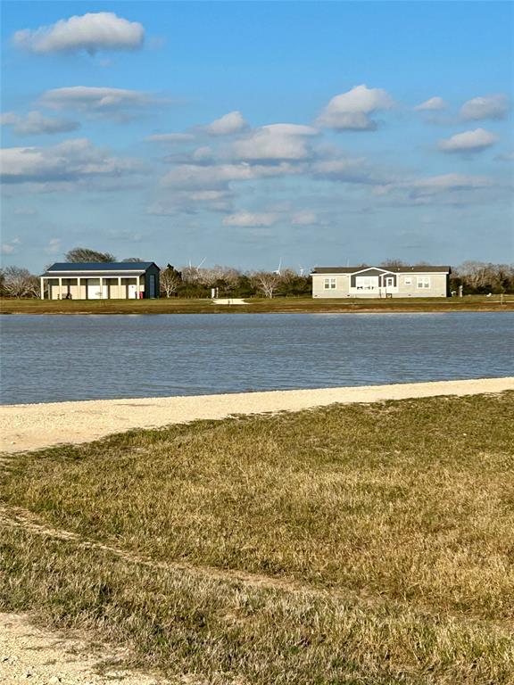 This Beautiful 21.34-acre property comes with a Move in Ready 3/2 Doublewide Modular Home, built in 2023. A big back porch area to sit and have your morning coffee and watch the deer. A new 30x50x14 Barn with a 12x50 lean. The property has a 4-acre Pond, Oak Trees throughout, Cattle Pens, Electric Gate and the entire perimeter is Fenced.