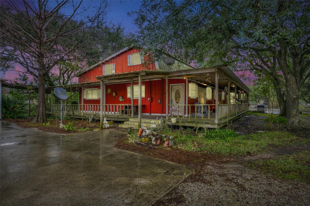 Working equestrian farm less than 2 min from 288 and new HEB, 4/2 main home w/ pool and approx. 1 ac. fenced yard, and 2/1 guest house is a rental listed BELOW 2025 APPRAISAL.  Brand-new (2024) 7 stall barn has automatic waterers, a tackroom, hayloft, 2 washracks, and double stall for nursing mares. Cross-fenced w/ 5 pastures, goat pen & dog run. The main house, surrounded by old oak trees, has a wraparound porch and a second-story deck overlooking pool & pastures, 2-4-car detached garage & 600 sq. ft. pool house with AC. The charming 1,100 sq. ft. rental is fenced. A dozen fruit trees and 70+ native species of trees, shrubs, & groundcovers thrive on the property. A decade of herbicide & pesticide-free land management has resulted in fireflies, commonly seen yearly. Farmhouse / Guest House can convey separately or not at all w/ easement for septic spray field & buyer pulling power from main home to barn.  Farmhouse Property can be conveyed separately