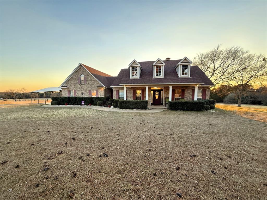 East TX Country Home for sale with Endless Possibilities! Situated on a beautiful 24.84-acre tract, this 2,530 sq. ft. home offers 3 bedrooms plus a bonus room (or 4th bedroom) and 2 baths with a covered front porch that welcomes you to slow down and enjoy the natural beauty of your surroundings. The open-concept living area with vaulted ceiling & fireplace connects seamlessly to the kitchen and breakfast nook. The large formal dining room accommodates larger groups. Enjoy spectacular sunset views stretching for miles from the back of the home and the elevated porch & deck. A separate 1,080 sqft garage has a 360 sq. ft. apartment w/ full bath; and a large 2,160 sqft workshop w/ electric. There is also a private shooting range with covered concrete pads 20-, 25-, and 100-yds from the targets. Separate RV carport. This one-of-a-kind property offers endless opportunities for recreation, work, and leisure, all in a peaceful country setting, just minutes from historic Palestine.