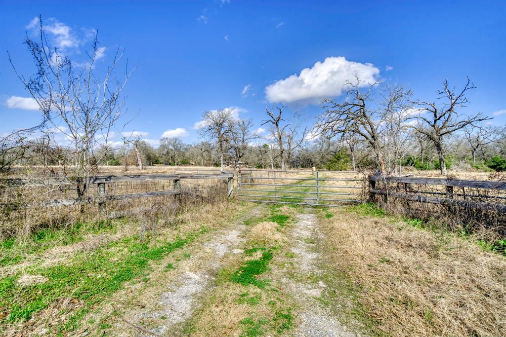 The Idaho Ranch is a 45-acre property in Eastern Madison County offering the opportunity to build a new home, enjoy nature, or use it for recreational purposes.  Currently used as a full-time residence, the 4/2 mobile home on-site can be rehabbed or removed by the new owner.  The terrain features a diverse landscape; presenting approximately 10% open and 90% wooded with a variety of native trees, hardwoods, softwoods, underbrush, and evidence of various types of wildlife.  Pine Branch is a seasonal creek that crosses this property tract providing a welcoming habitat for wildlife, there is a stock pond, making this property equipped for multiple outdoor activities, and/or raising livestock; an agriculture exemption is already in place.  This exceptional property is ideal for redevelopment, full time living or simply enjoying a relaxing weekend getaway with loved ones and friends.  Great central location between Houston, Dallas, Palestine and Bryan/College Station.