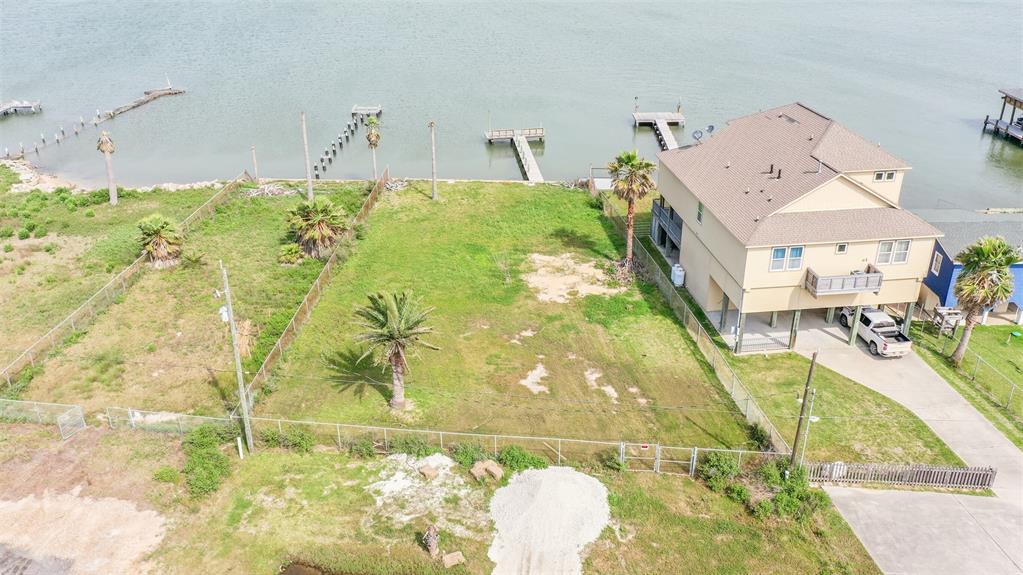 APPROX 13,692 SF OF LAND .OVER LOOKING GALVESTON BAY .. BEAUTIFUL VIEWS OF THE GALVESTON CAUSEWAY . APPROX 65 ' FRONTAGE ON THE WATER. TROPICAL BIRDS THROUGHOUT THE GROUNDS /WETLANDS . QUIET SOLITUDE AWAITS YOU !! CHECK OUT THE AERIALS FOR YOUR WATER VIEWS OF THE AREA ..