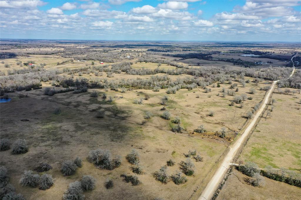 Highly desirable 88 acres located less than 5 miles southeast of downtown Madisonville. The property is predominately rolling hills of open pastureland with some areas of woods along the drains that lead to Pooles Creek. A number of large oaks dot the hills and the area along the creek is wooded with large oaks and elms. On the eastern boundary following along the creek, a new fence was recently built. Within the 88 acres, one pasture of approximately 12 acres is separately fenced and includes a nice pond. A new fence will be needed on the western boundary. A small portion of the property along Pooles creek may be considered flood plain, but this area is highly attractable to wildlife. A number of building and lake sites are available. Property is 1.5 hours north of Houston and 2+ hours south of Dallas, in what is considered the golden triangle of Texas. Possibly one of the most attractive acreage tracts available in the area. Location is second to none!