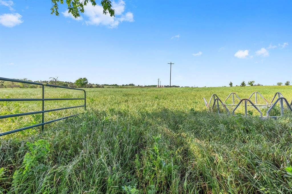 PRICE AT LAND VALUE ONLY! This fantastic +/-35 acres located between Brenham and Burton, is just .1 miles from HWY 290! This property has so much potential for so many buyers! Currently set up as a horse farm, this property has a barn, 6 loafing sheds and several paddocks/pastures for all of your horse needs. With just a few small changes, this property can morph into anything your heart desires. The 2017 Clayton double wide manufactured home on property is in good condition and is connected to a well maintained water well with shed. Don't forget to notice the water softener! The huge 30x40 powered carport/shop next to the home offers the buyer protection for the cars and toys to go along with a second room for storage. Per WCAD, +/-33 acres have agriculture exemption for native pastures. +/-10 minutes to Brenham amenities. +/-75 minutes to Downtown Houston. Excellent property for your family home/family compound/RV park/mobile home park/storage facility/industrial park.