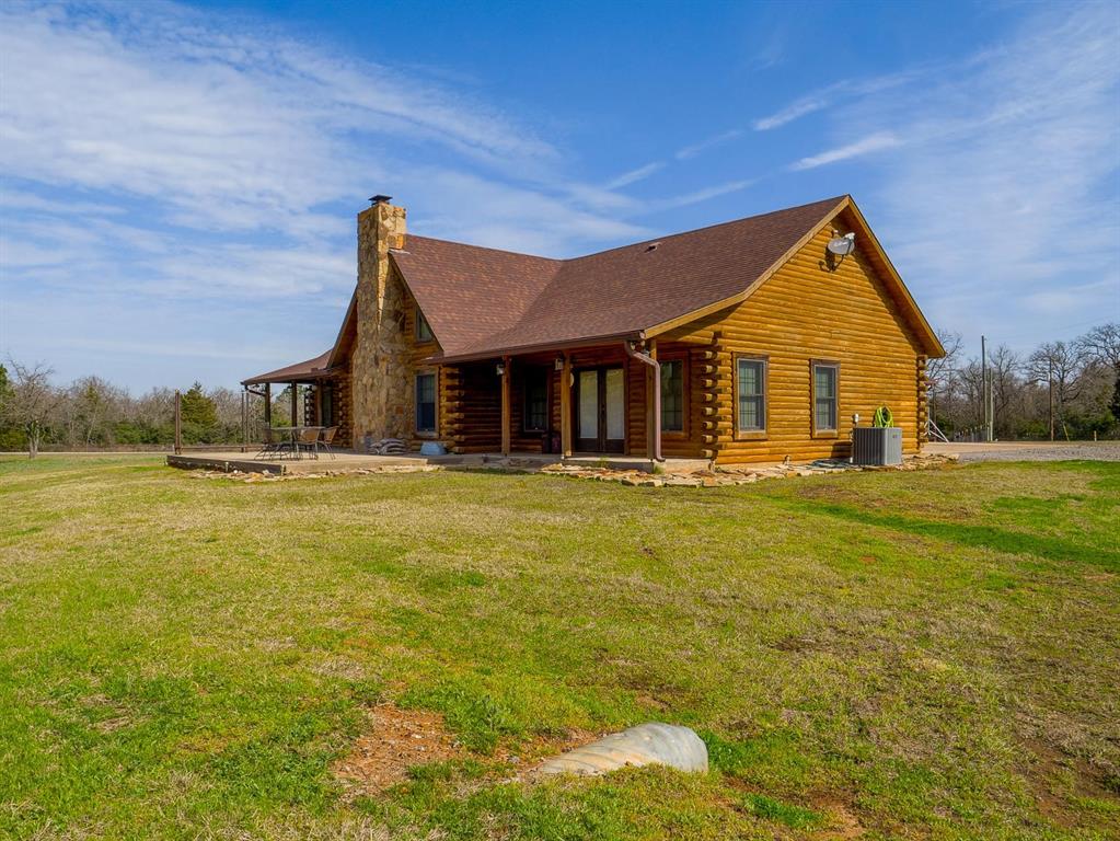 Welcome to Weisinger Ridge- A 102-acre versatile property located between Centerville and Buffalo. Southland custom built log home with great attention to detail, open concept, granite countertops, gas range with oven and a double oven as well. Living room has vaulted ceiling with large windows and stone fireplace. The primary suite is large and can accommodate large furniture, primary bathroom with separate walk-in shower, free standing tub, and double vanities. The 2nd bedroom has a full bath, both rooms have large walk-in closets. The loft upstairs is currently being used as a home office but could easily be converted into a third bedroom, it does have a half bathroom as well as a covered porch. Home comes with 20KW Generac Propane generator. The outside building has a climate-controlled storage room, fully enclosed 15x40 shop, 30- and 50-amp power, air compressor with multiple hose connections. Schedule your private showing and see all that Weisinger ridge has to offer.