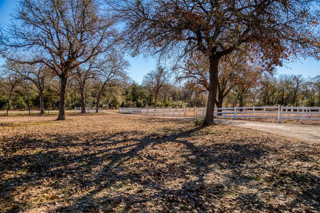 +/- 47.26 acre multi-generational ranch that served as a miniature horse ranch for 43 years now available. Wildlife exemption is currently in place via deer & song birds. Approx. 6,680’ of road frontage from FM 975, CR 117 & Private Rd. 

Mature hardwoods for privacy and rolling terrain with a 30’ difference in elevation. The horse barn includes 14 stalls, feed room, electric & water. Perimeter & cross fenced with several loafing sheds throughout, 4 carports & equipment shed. 5 electric meters, 2 water wells & 4 septic systems on-site. 

The main home is 2,262 SF with 3 beds, 2 baths & office. 2nd living quarters with a 756 SF - 1 bed/1 bath guest home including a kitchen and a 3rd living space featuring a studio cabin with private bath & kitchen. Utilities/Propane hook-ups are installed for an additional home. 

Located in the Heart of Central Texas - Caldwell: 6 miles, College Station: 29 miles, Brenham: 33 miles, Austin: 83 miles, Houston: 107 miles.