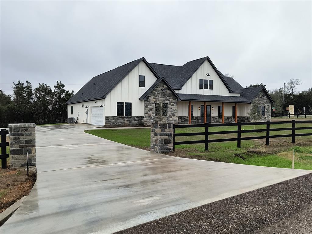 Gorgeous new farmhouse minutes from highway access, major shopping, and downtown Brenham. Room to relax, this property is one and a half acres overlooking the cattle from your back porch, in a quiet country neighborhood. This home features 3 bedrooms and 2.5 baths with an additional office space or playroom. The open-concept floor plan is perfect for entertaining with a spacious family room with a soaring fireplace and tons of natural light overflowing into the dining space. A chef's dream kitchen awaits quartz countertops, custom solid wood cabinetry with soft-close fixtures, an apron front sink, and appliances included. Beautiful master retreat with charming in-suite boasting a large shower and soaking tub adjoining the walk-in closet. Too many details to put into words this home is a gem! Call for your viewing opportunity today!