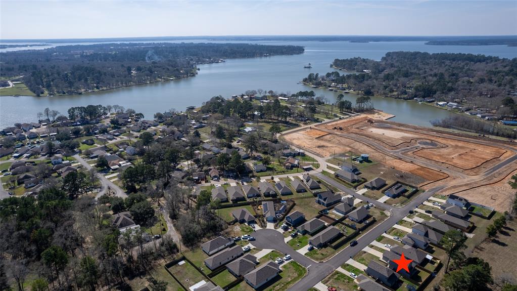 12990 Sorrento Bay Drive Willis, Texas Enjoy the LAKE LIFE! This is a great opportunity to own an inexpensive home in a LAKE CONROE community. Enjoy access to LAKE CONROE and be on the lake in minutes to enjoy fishing, skiing, or just the beautiful views on a boat ridge! You'll love this area in Willis, TX. It's QUIET, PEACEFUL, and BEAUTIFUL! You are close to all the services you need everyday and can be in Conroe, The Woodlands, Montgomery and more very quickly. You are close to I-45 so getting to Houston or IAH for a commute are reasonable distances as well. This home is recently built and in great shape with all the finishes one would expect. Primary bedroom PLUS a study downstairs give everything you need on the first floor. Secondary bedrooms and gameroom on second floor. Another FEATURE of this property is no back neighboring home looking at you. There is a green space behind this home for ADDED PRIVACY and beauty. All this for a great price so come get it quick!