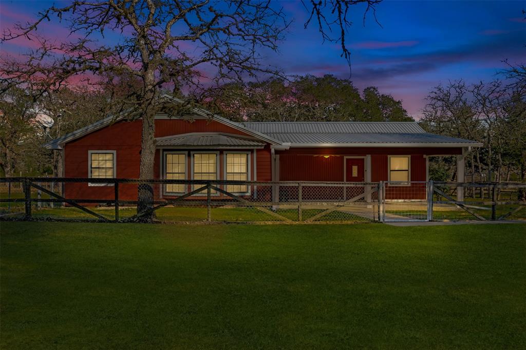 Welcome to this charming country home on 5 acres! With a spacious living room, farm-style kitchen, breakfast area, walk-in pantry, dining room with bay window, this property offers the perfect blend of comfort and functionality. Three bedrooms with ample closets, two and a half bathrooms, and 2 sets of French doors leading to the back patio provide a cozy retreat. Additional features include a circle driveway, metal workshop, outbuildings, unrestricted land, paved frontage, scattered trees, cross fencing, perimeter fencing, and wildlife. Just 10 miles from downtown Columbus, this serene and peaceful setting is must-see. Don't miss out on your new home - call today!