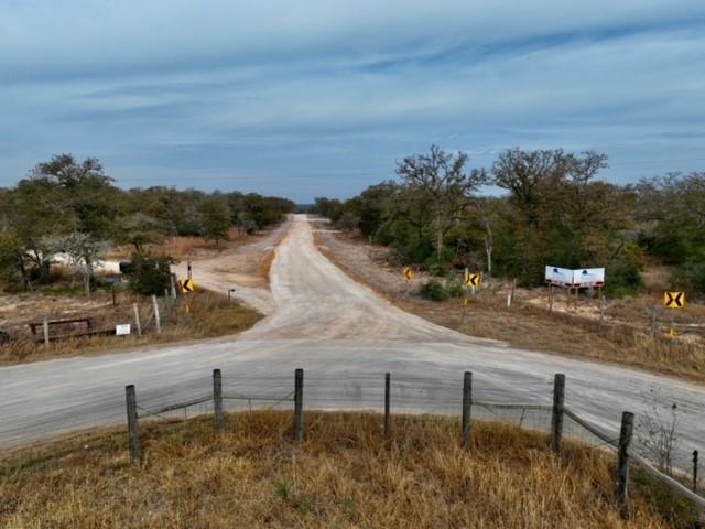 Close to San Antonio and Austin. Private road is finished. Seller will fence the tract and install farm gate. Seller is bringing power along the road. 
Gate is open to view the property. 
Part of Tax ID 72336