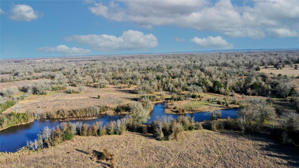 This stunning 17-acre tract offers a perfect balance of open space and natural beauty, featuring both cleared areas and wooded sections, along with a tranquil pond. Whether you’re looking for room to build your dream home, start a hobby farm, or simply enjoy the outdoors, this property has everything you need. The cleared land provides ample space for development or agricultural use, while the wooded areas offer privacy, shade, and the opportunity to explore. The pond adds a peaceful touch to the landscape, perfect for fishing or simply relaxing by the water. Surrounded by mature trees, it’s an idyllic setting that provides a sense of seclusion while remaining easily accessible. Conveniently located near local amenities, schools, and major roads, this property offers the perfect blend of country living with access to modern conveniences. Whether you're looking for a recreational escape or a place to create your own vision.